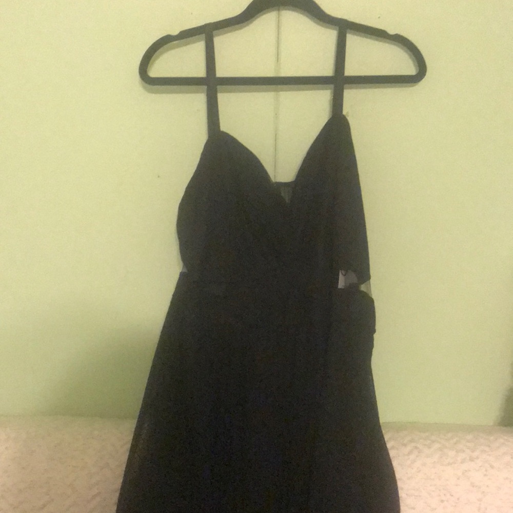 Beautiful black dress, never worn.